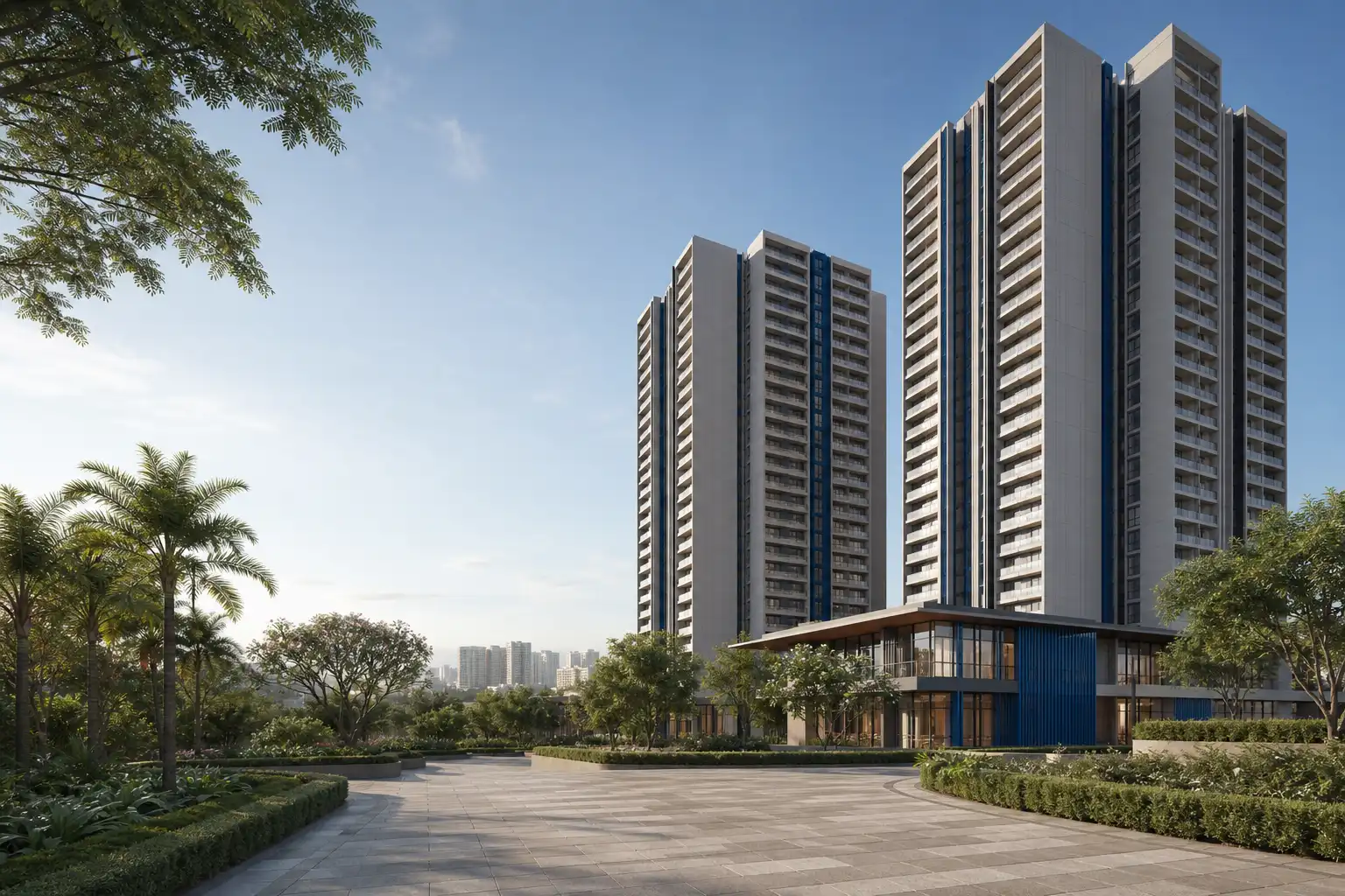 Two contemporary residential towers beyond a landscaped arrival court and lower community building